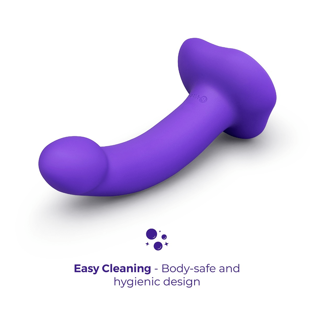 B-Vibe Vibrating Curved Strap-On Dildo on a white background with text about easy cleaning and hygienic design