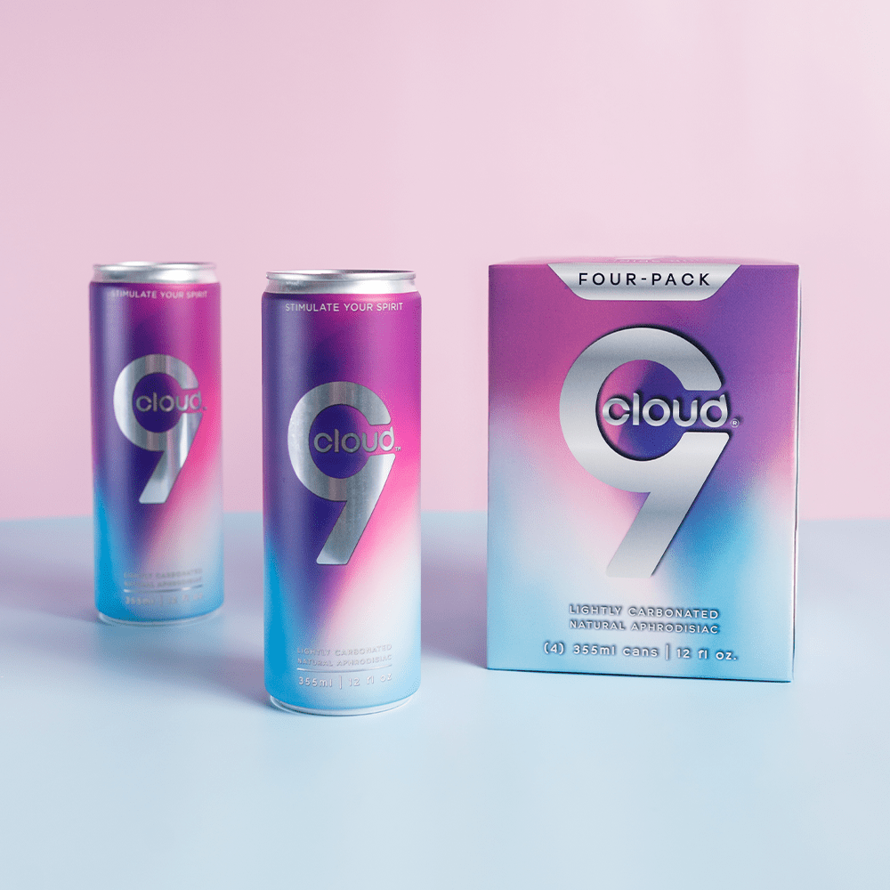 Two cans and a 4-pack box of Cloud 9 Aphrodisiac Drink on a light pink background