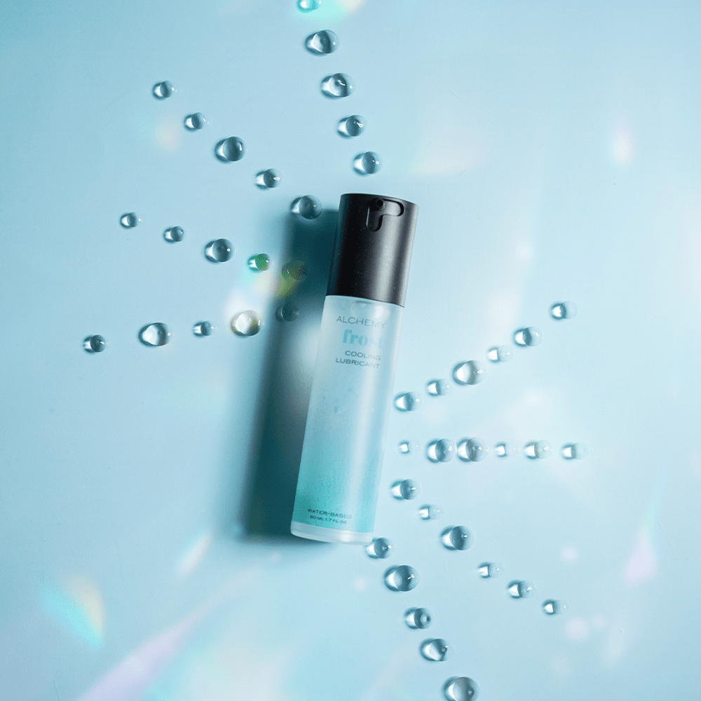 Alchemy Cooling Personal Lubricant bottle with liquid droplets