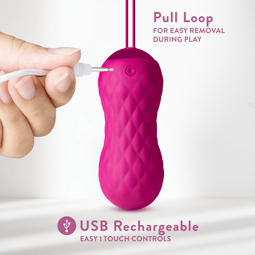 Blush Carina Velvet bullet vibrator with power cord plugged in