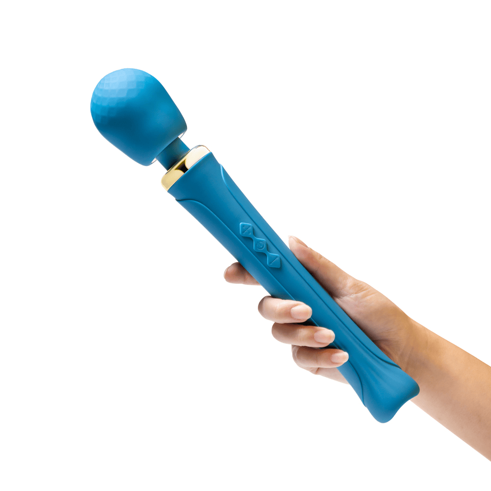 Blush Dianna teal wand massager in woman's hand