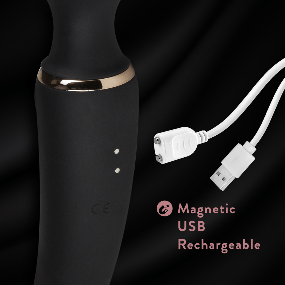 Blush Gia black wand massager with power cord plugged in