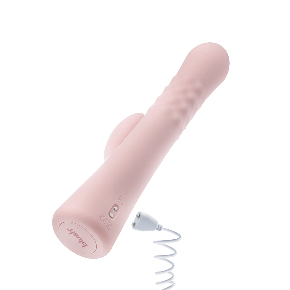 Blush Jaymie pink rabbit vibrator with power cord plugged in