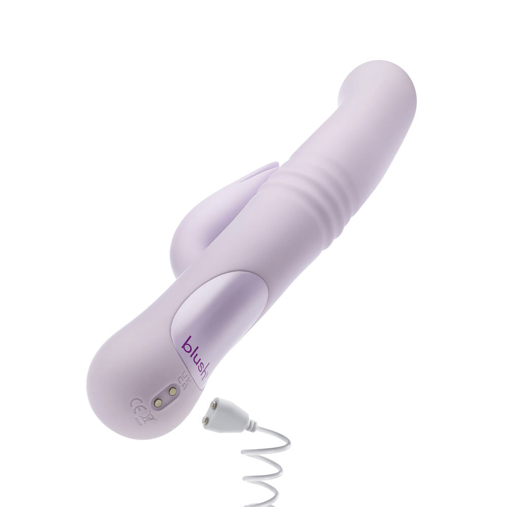 Blush Rylee lavender rabbit vibrator with power cord plugged in