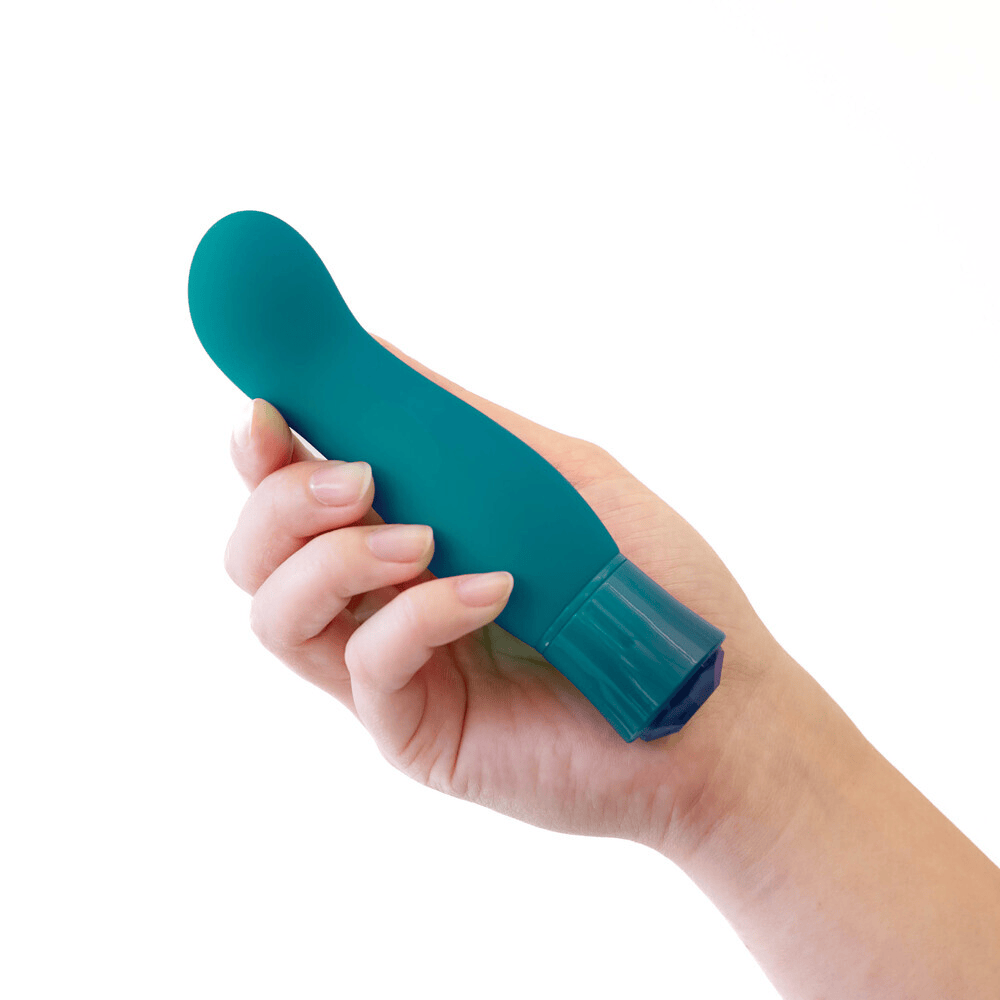 Blush Oh My Gem Fierce Blue Topaz bullet vibrator in woman's hand