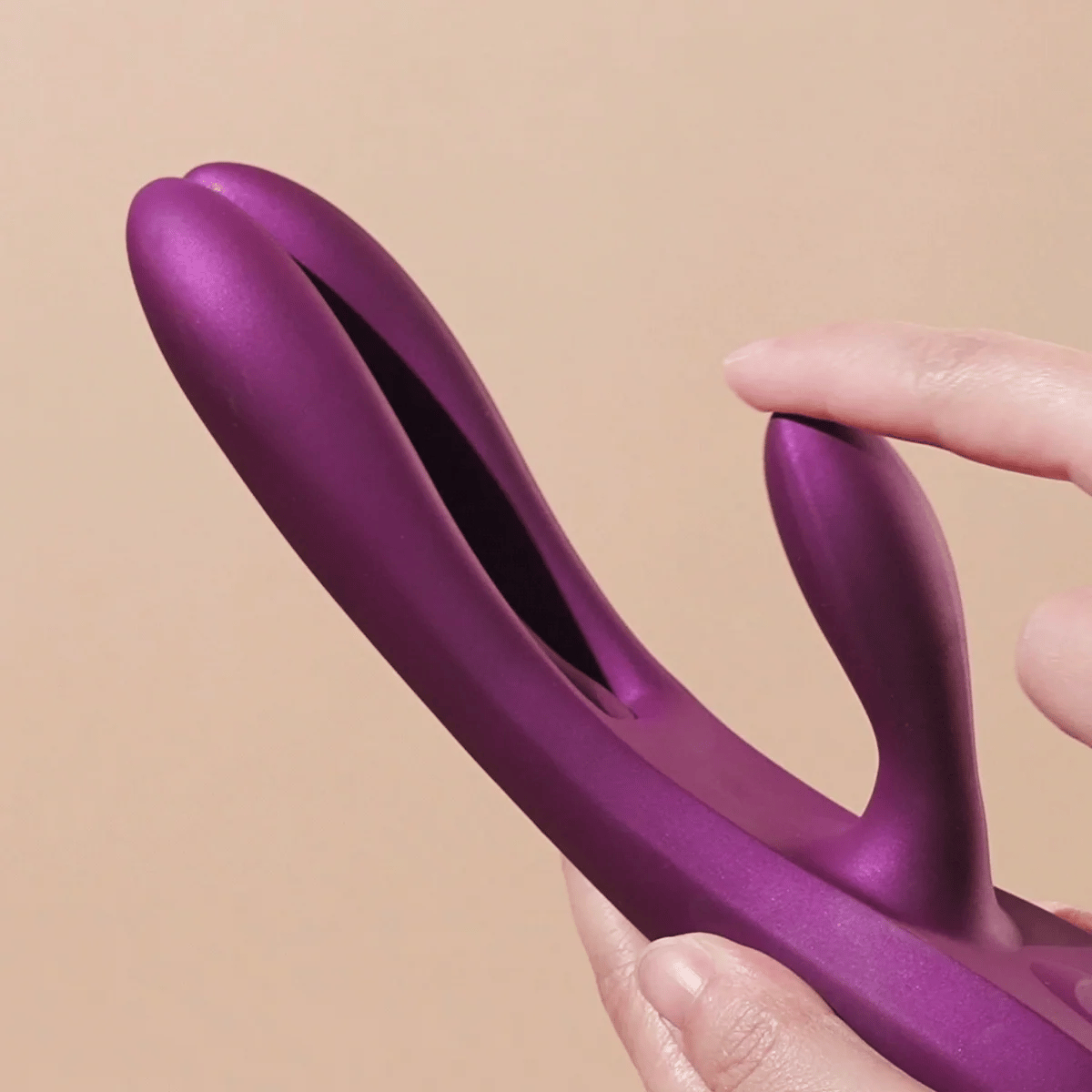 Honey Play Box Terri App-Controlled Rabbit Vibrator animation of woman flicking rabbit arm, showing flexible silicone