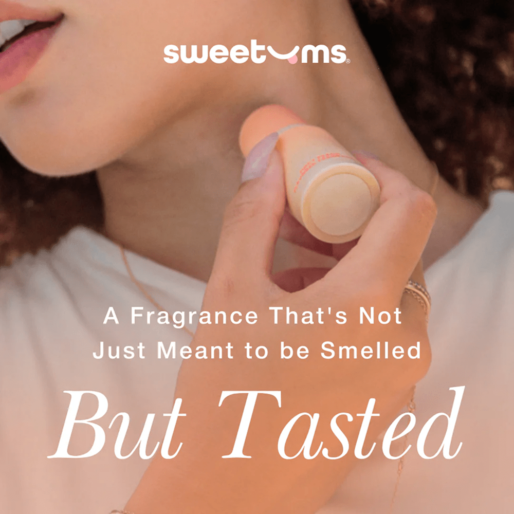 Sweetums Sweet Spot: A fragrance that's not just meant to be smelled, but tasted. White text on a photo of a person applying Sweet Spot to their neck