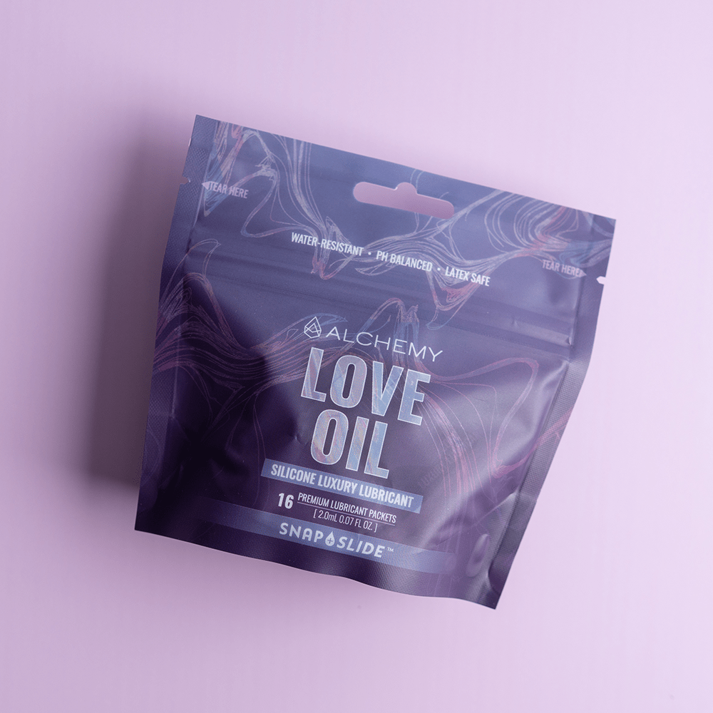 Alchemy Love Oil Silicone-Based Snap + Slide Single-Use Personal Lubricant Packets premium pouch packaging