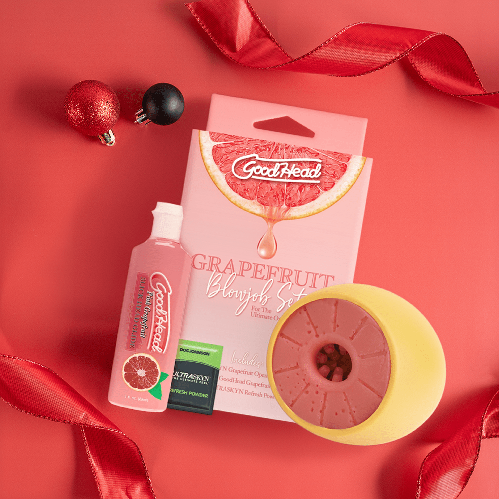 GoodHead Grapefruit Blowjob Set: top view of product on a red background with red ribbons and black and red holiday ornaments