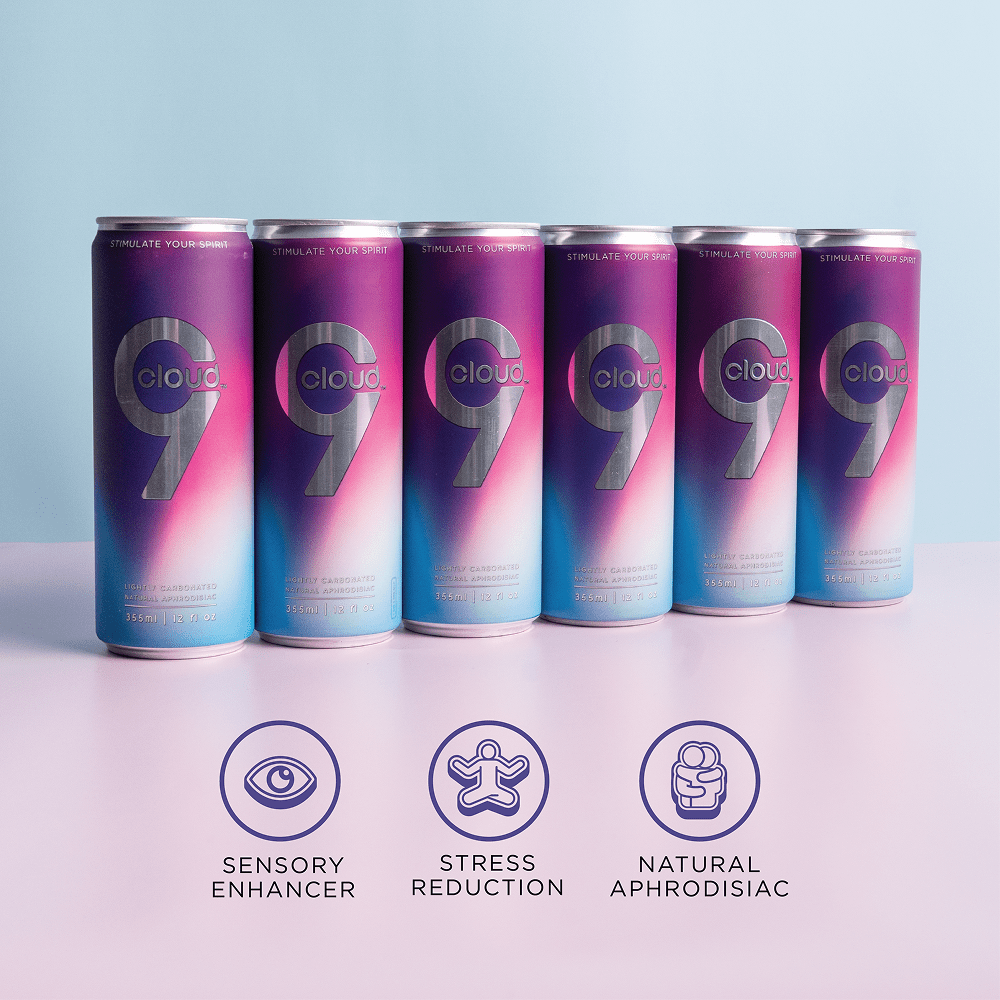 Six cans of Cloud 9 Aphrodisiac Drink cans on a light purple background with icons and text that say "Sensory Enhancer; Stress Reduction; Natural Aphrodisiac"