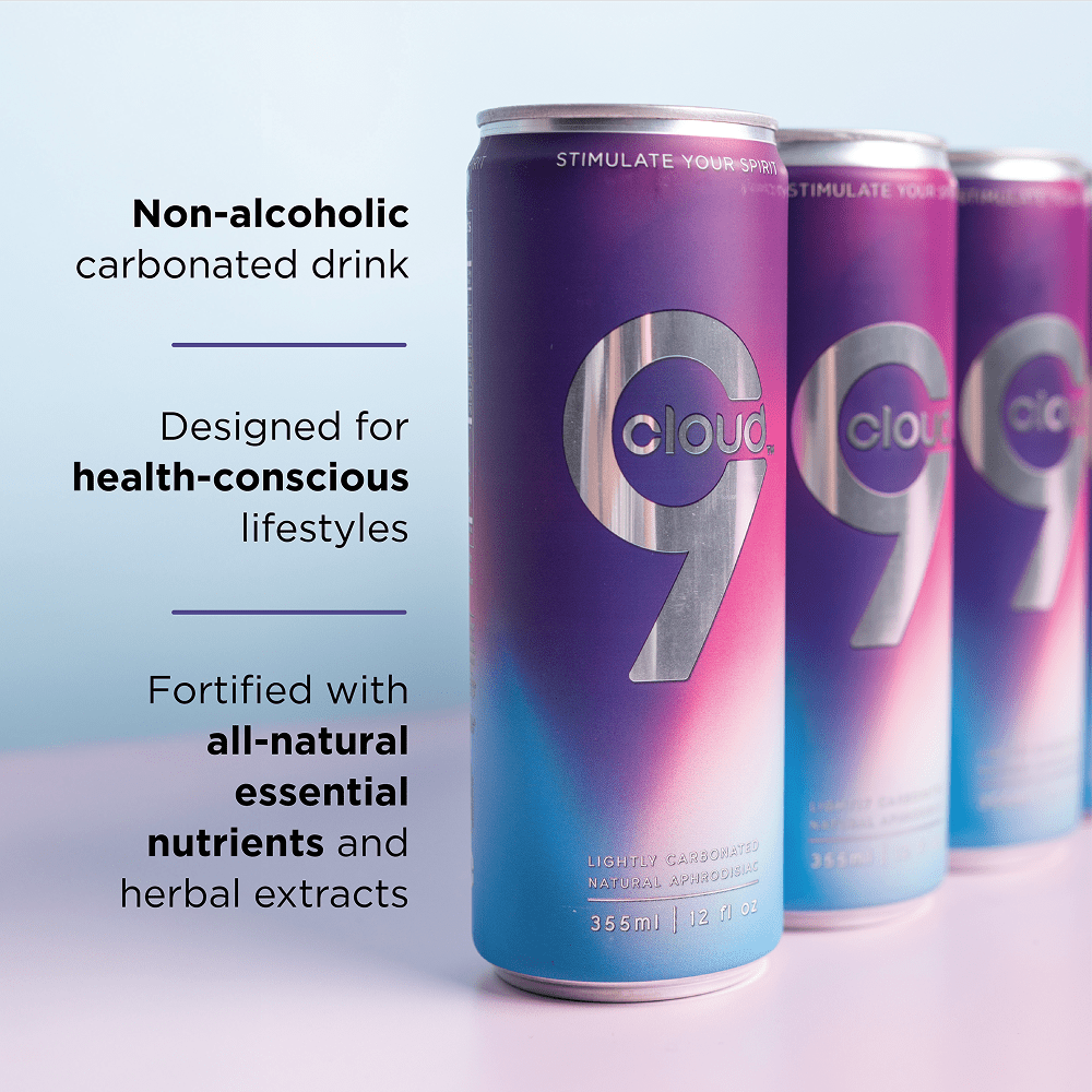 Cloud 9 Aphrodisiac Drink: purple aluminum cans in a studio environment with soft lighting and text that says "Non-alcoholic carbonated drink. Designed for health-conscious lifestyles. Fortified with all-natural essential nutrients and herbal extracts."