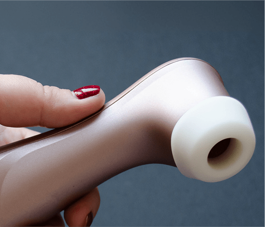 Close-up photo of a Satisfyer Pro 2 Gen 3 air-pulse vibrator on a dark blue background