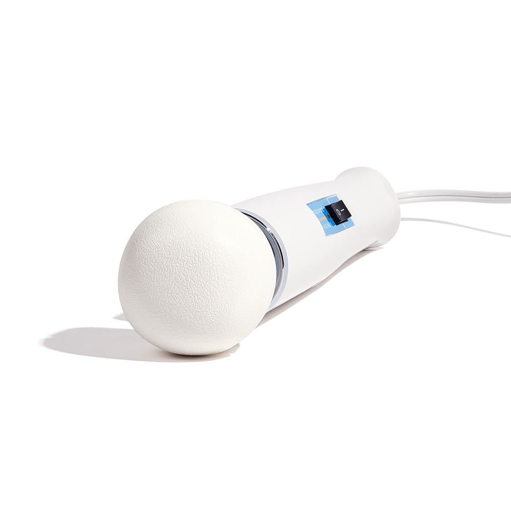 Close-up photo of the textured vinyl head of the Hitachi Magic Wand Original HV-260 plug-in wand massager on a white surface with bright overhead lighting