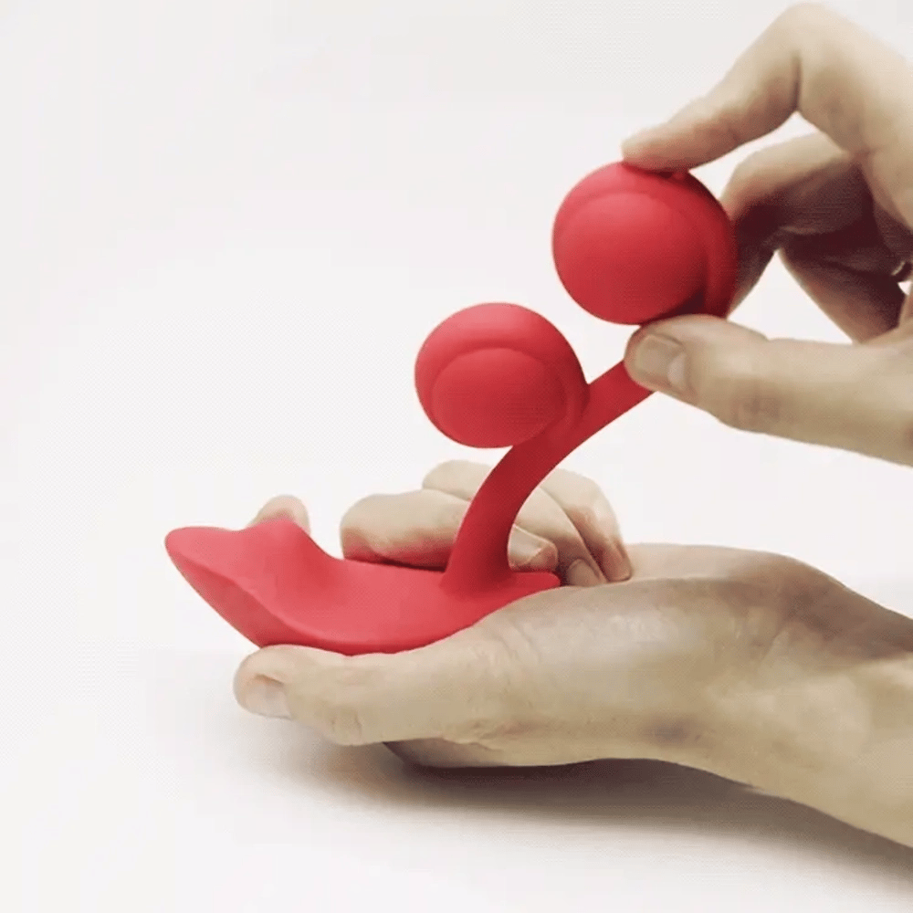 Honey Play Box Melody App-Controlled Kegel Vibrator -video of a person's hands bending and releasing the product to show its flexible yet rigid structure