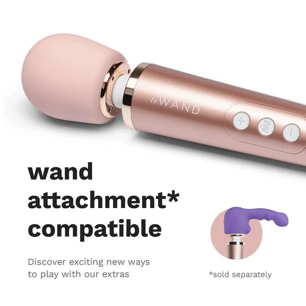 Le Wand Petite rose gold Luxury Wand Massager Vibrator cropped photo on a white background with dark gray text that says "Wand attachment compatible: discover exciting new ways to play with our extras (sold separately)"