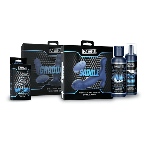 Men.com Backdoor Bundle: Man Bands Silicone 3-Ring Set, Graduate Beaded Anal Trainer Set, Saddle Remote Prostate Stimulator, Pump Hybrid Lubricant bottle, and Power Wash Foaming Toy Cleaner with shadows on a white background